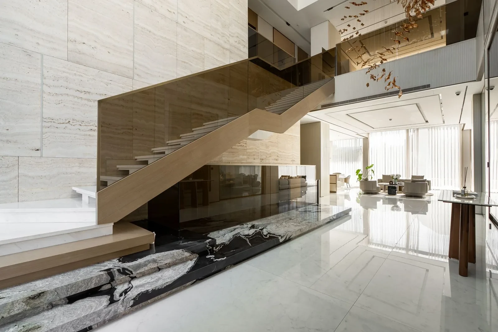 Bespoke staircase with glass balustrade at Villa Alma, Dubai Hills
